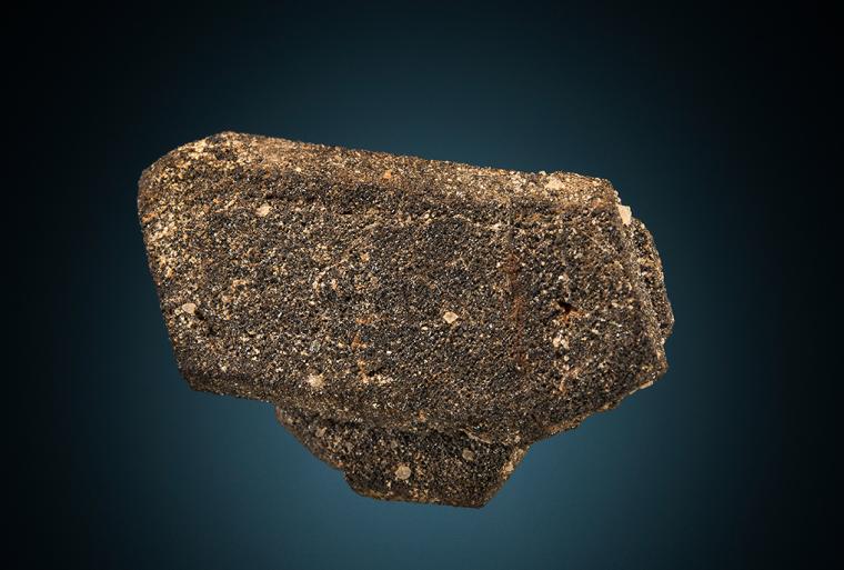 CASSITERITE after ORTHOCLASE
